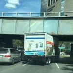 A truck struck an overpass while traveling on Storrow Drive Tuesday afternoon.